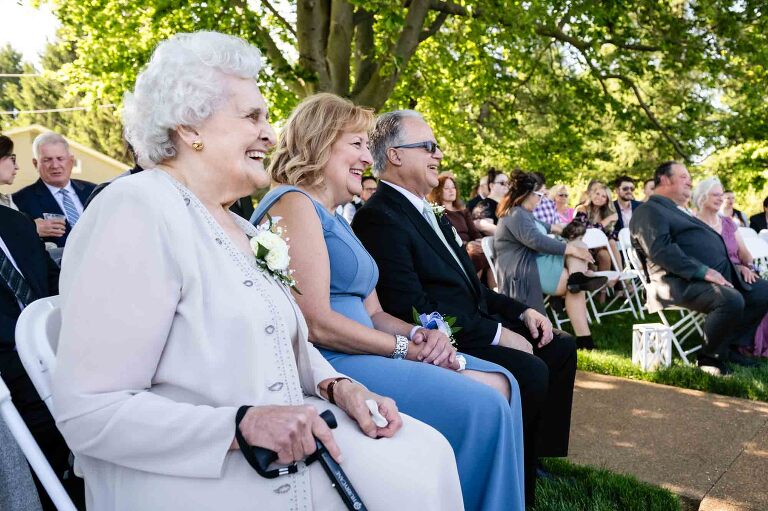 guests enjoy the shaded wedding ceremony at pinehall farms