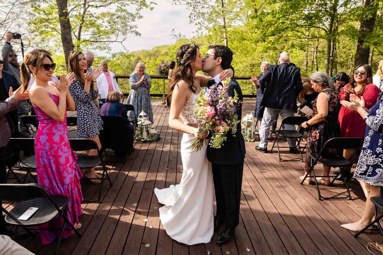 bride and groom kissing at their relaxed outdoor wedding, taken by pittsburgh documentary wedding photographer