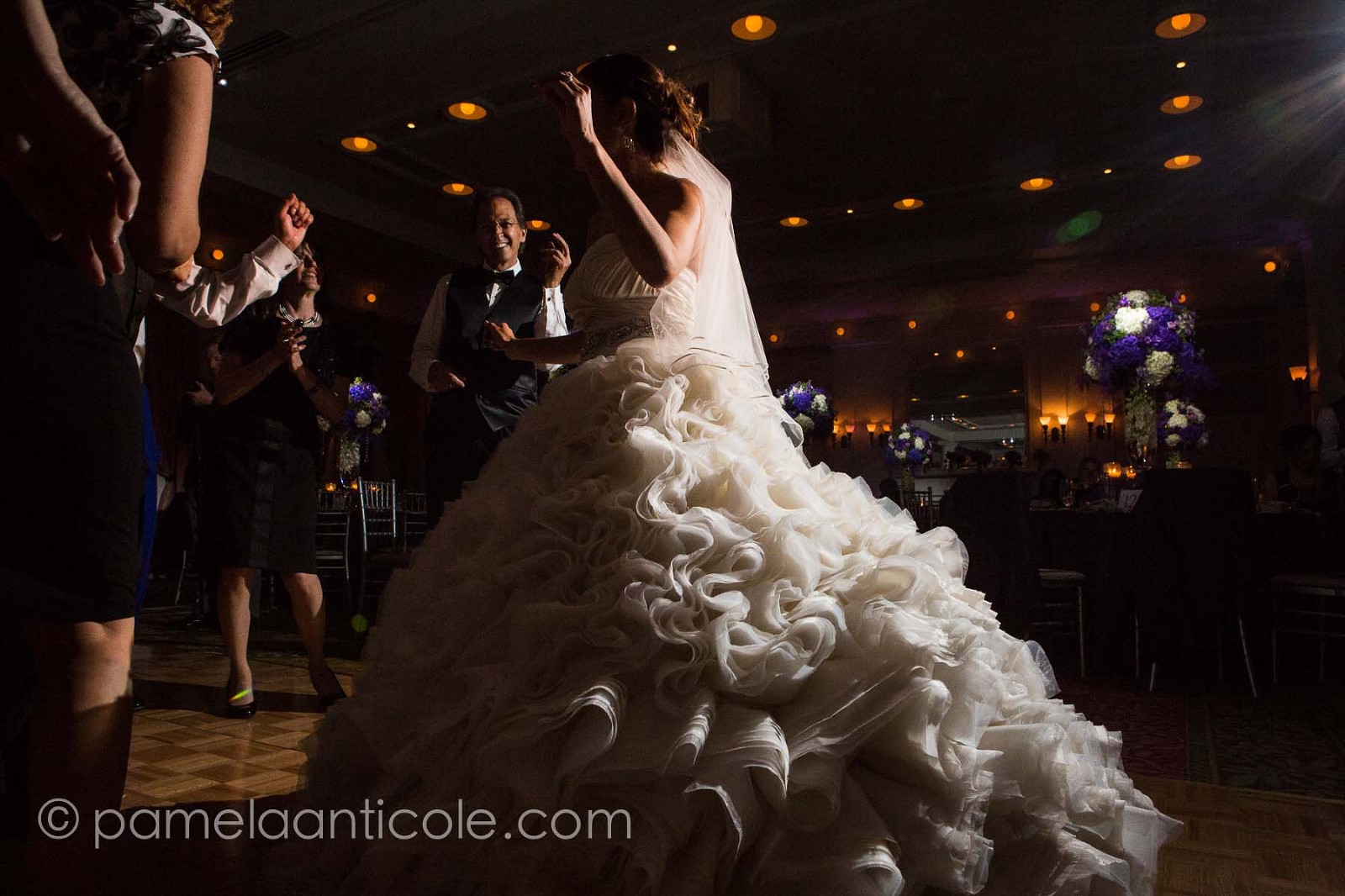 bride dancing at her wedding reception at the bedford springs colonnade ballroom