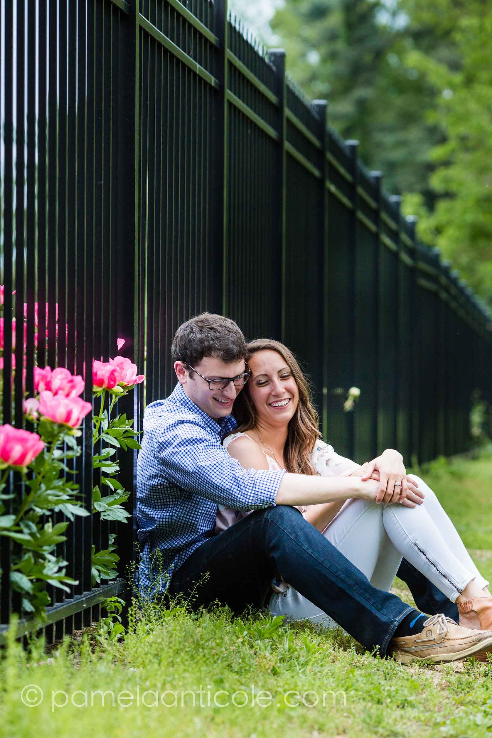 bride and groom relaxed and laughing in a rose garden, experienced pittsburgh wedding photographer, relaxed engagement photos in pittsburgh, relaxed wedding photos, hartwood acres engagement session
