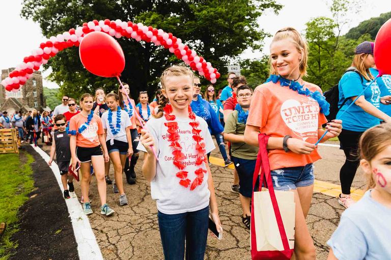kids leading off the heart walk in north park, pittsburgh