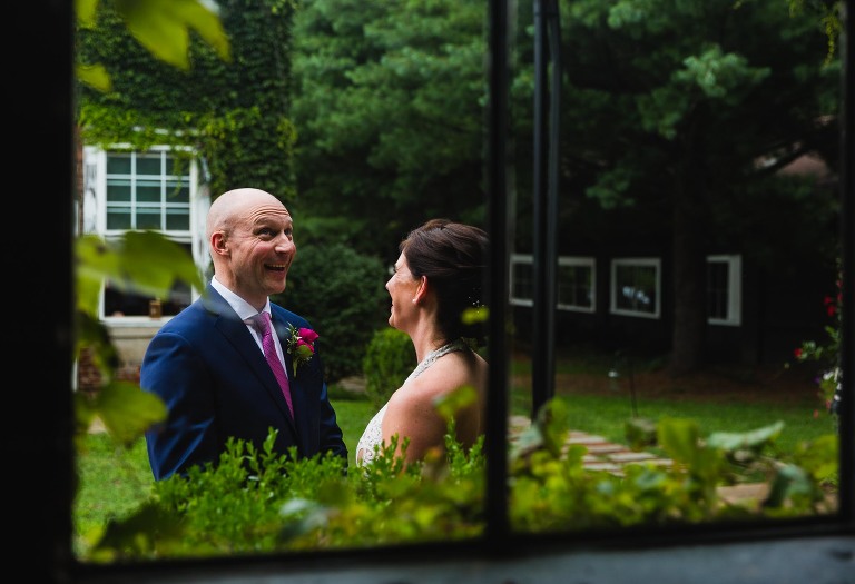 groom seeing bride for the first time, laughing and making goofy faces