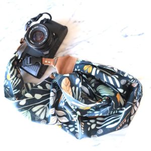 camera scarf strap, with vibrant pattern in neutral blue tones