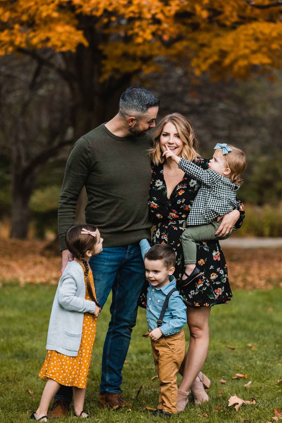 coordinated family casually hanging out in the park for family photos