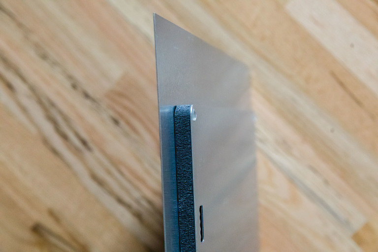 side view of the back of a metalprint, ready to hang with a standout mounting option