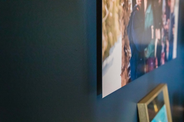 metal wall art sits off of the wall with a modern gap