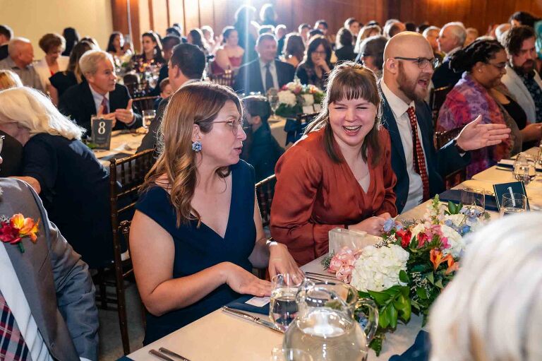 guests have dinner at the WBU Event Venue weddings ballroom upstairs.