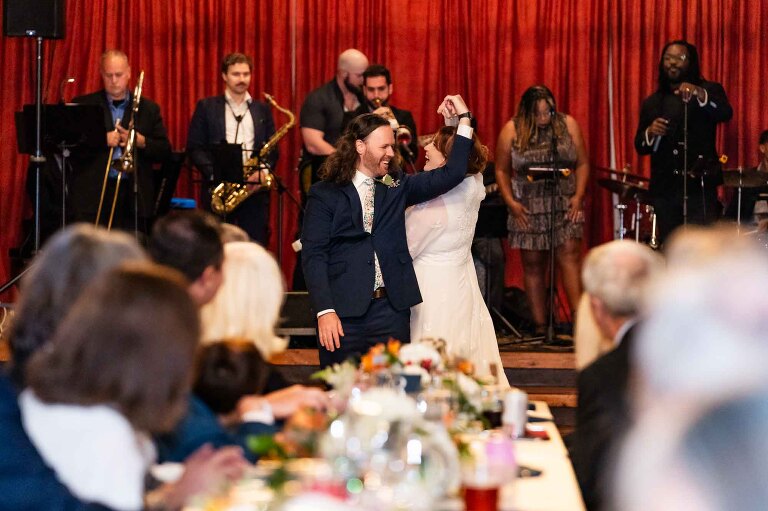 Dance your way in front of a band set up on a stage in the grand ballroom! all these WBU Event Venue wedding photos pictured are taken by award winning professional photographer Pamela Anticole