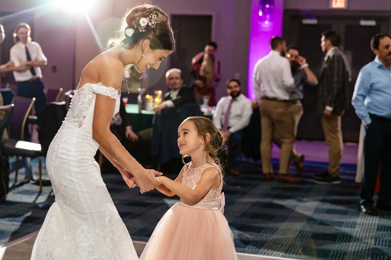 bride dances with flower girl at duquesne power center weddings