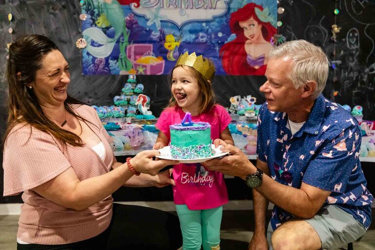 four year old birthday party at a play house in pittsburgh, singing happy birthday with cake