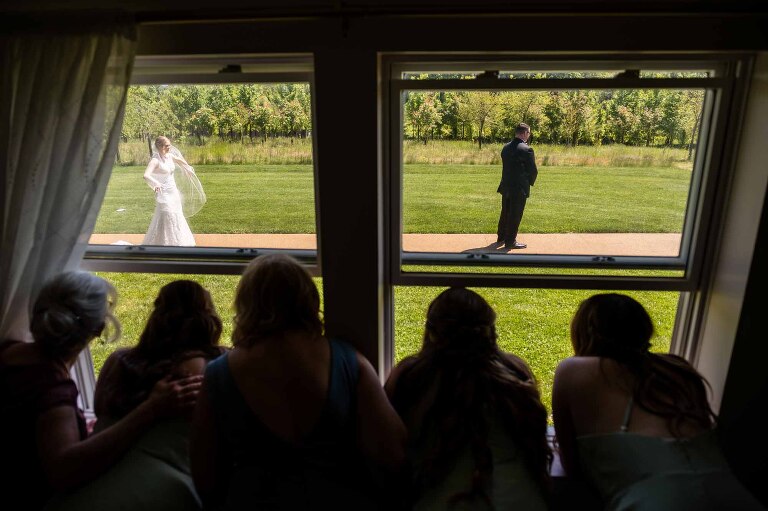 bride and groom see each other for the first time at their first look at pinehall farms